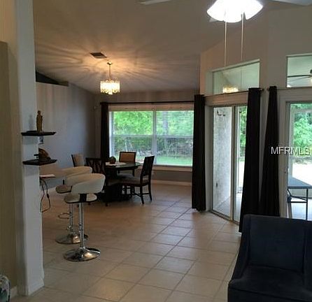 View from living area to breakfast room and Lanai