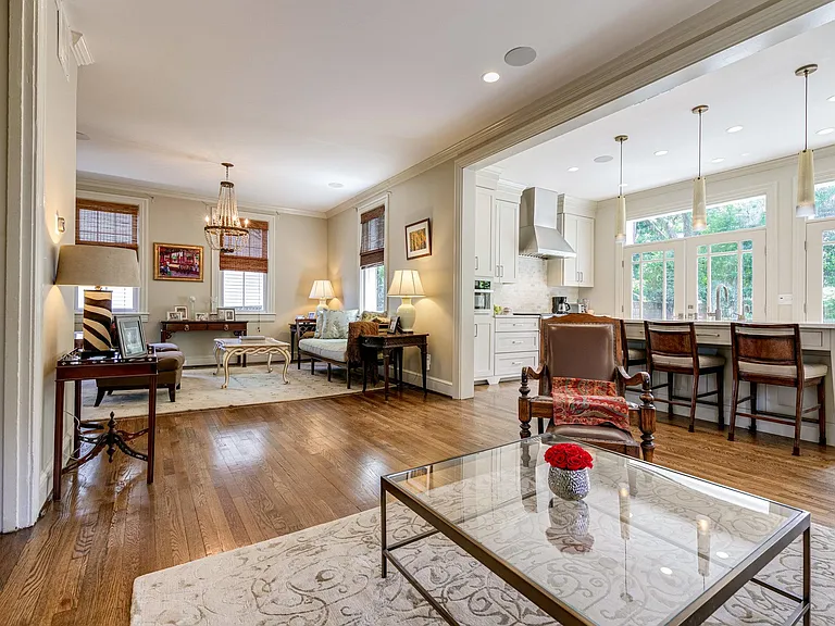 Overview of den, living room and kitchen area.
