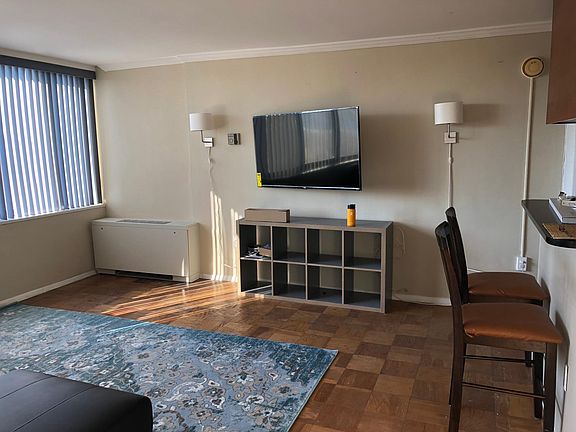 55" wall mounted smart TV and storage