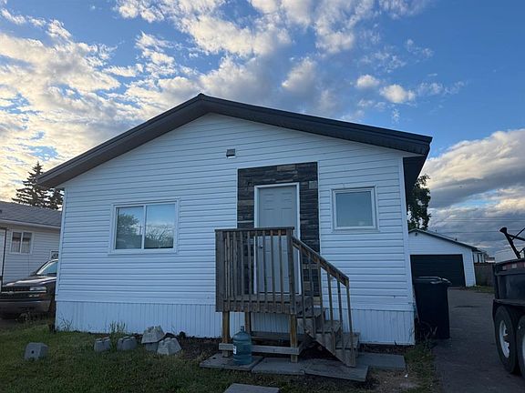 2nd image of 9908 E 103rd Ave