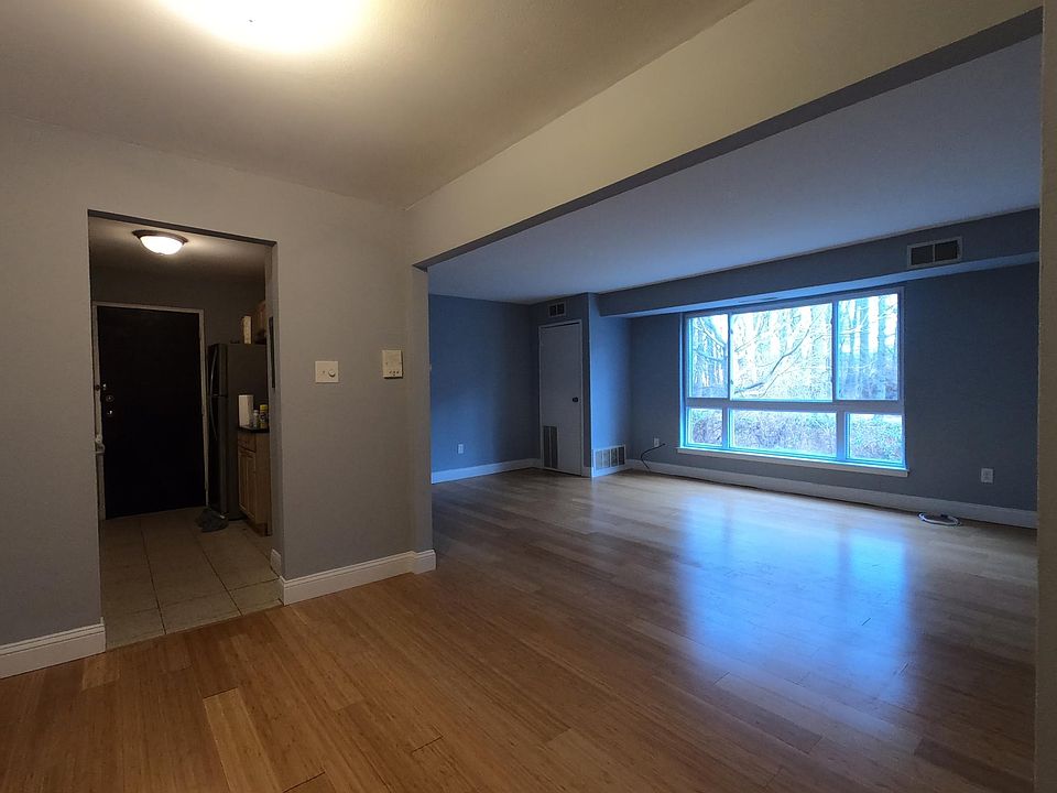 spacious living room with a lot of natural light