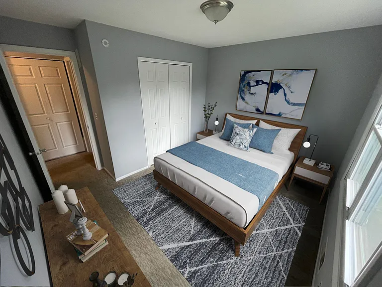 2nd bedroom upstairs. Hallway and stairs are on the left that leads down to the main level.