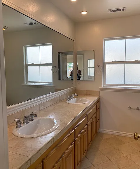Bathroom with Double Vanity and Tub Shower