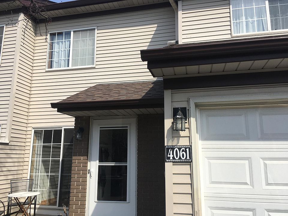 Outside View with Attached Garage