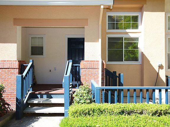 front entry with porch & patio
