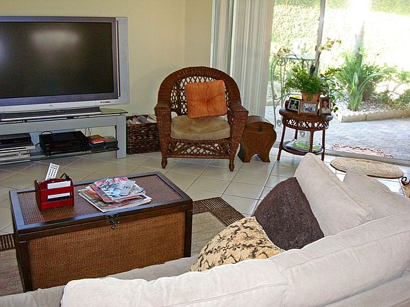 Spacious den leads out to the patio