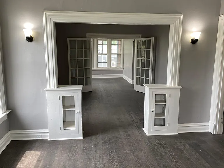 Built in bookcases and office/sunroom doors!