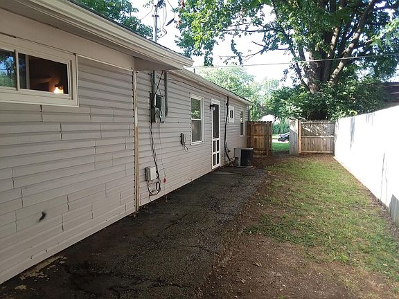 Rear fenced and gated back yard