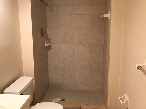 Brand new tiled bathrooms with new medicine and vanity cabinets