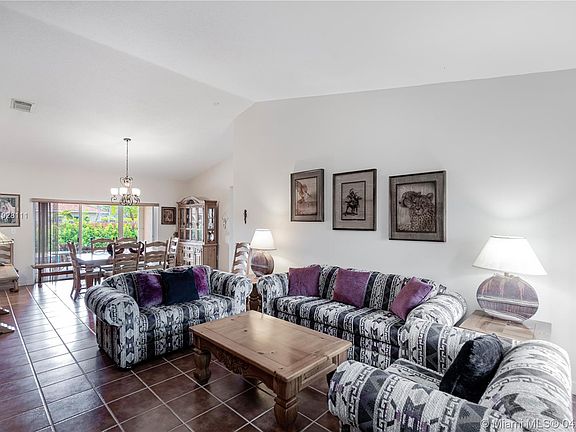 Living room with vaulted ceilings