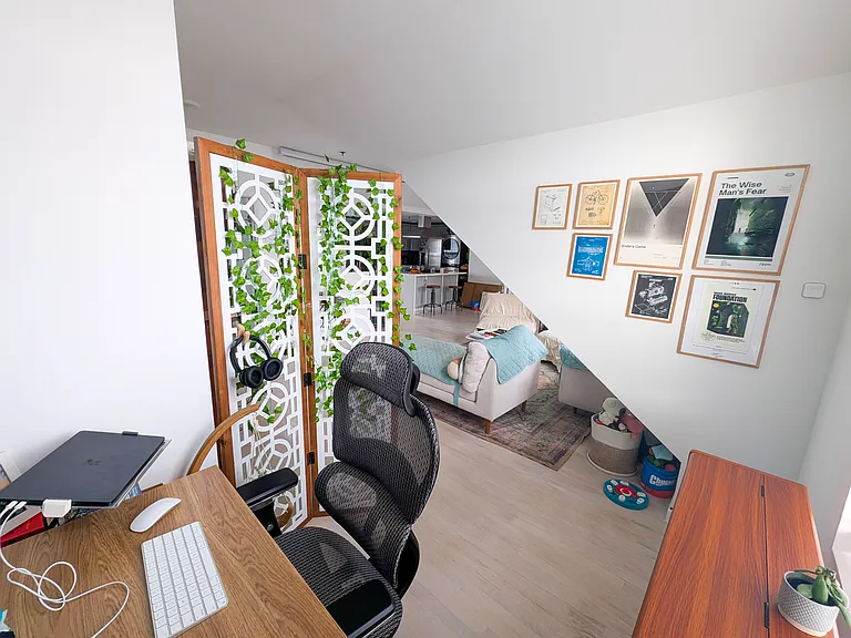 View from living room corner office into the broader living room