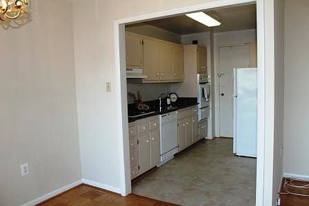 Kitchen with granite counters and gas cooking