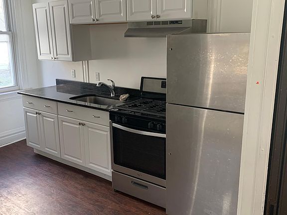 2 of two Kitchens: Stove, Sink, Granite Counter Tops, Stainless Fridge!