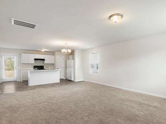 Living Room 
__ Open concept living with kitchen views _ light, airy & move-in ready!