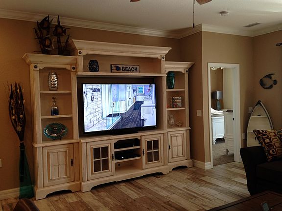 65" TV, DVD player, cable, internet