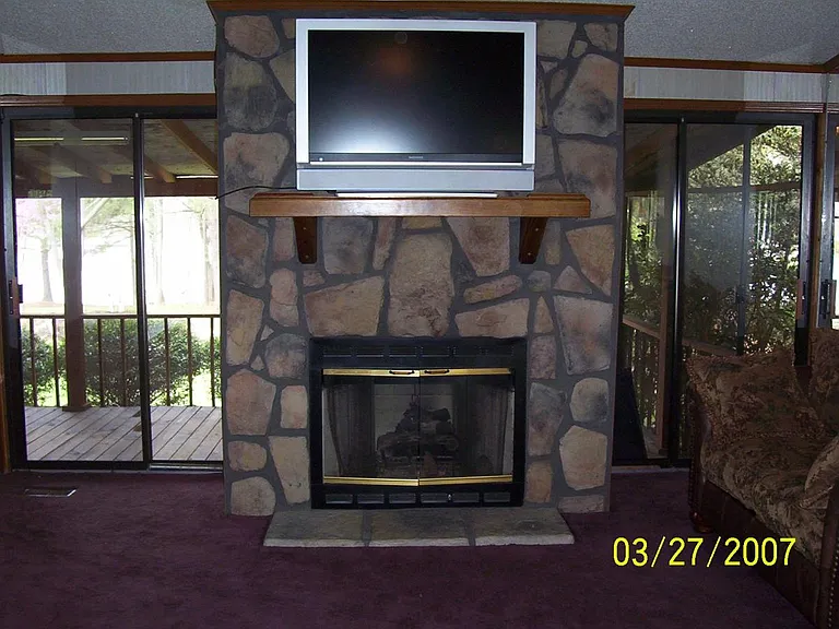 Living room fireplace (Carpet replaced with hardwood) Doesnt
