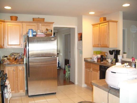 View of Kitchen from breakfast nook into Dining room