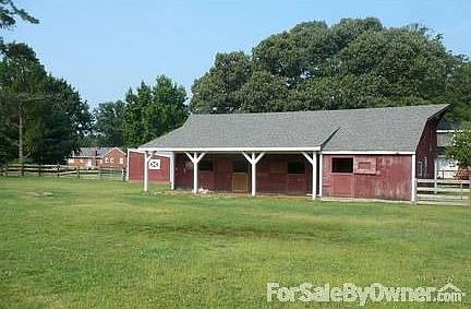 From back pasture looking at barn : New barn addition provides plenty of space for horses to get out