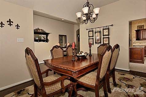 Wood floors continue through Formal Dining Room.