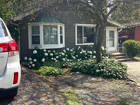 two parking stalls & on-street parking in front of the house