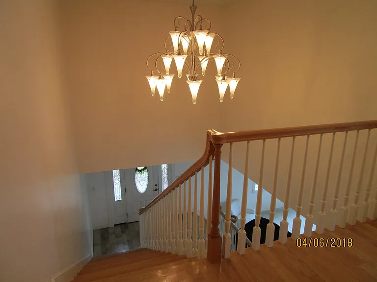principal stairway to bedroom floor - view toward entrance
