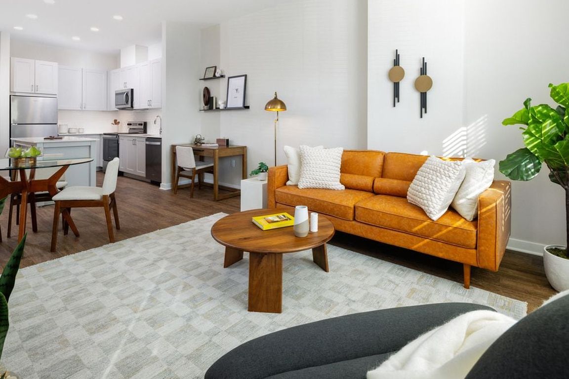 New West Phase - Finish Scheme III Living area with hard surface flooring throughout