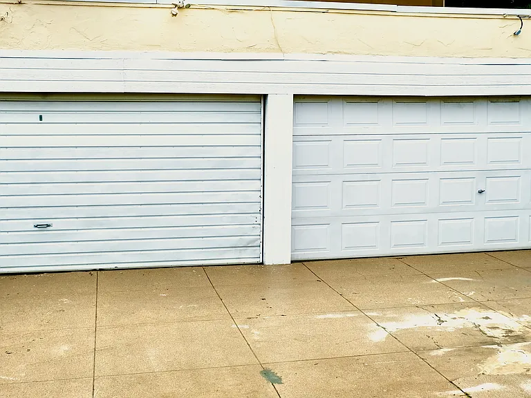 GARAGES IN FENCED, LOCKED AND SECURE BACKYARD AREA