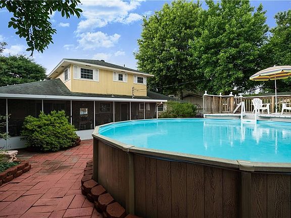 Lemonade, sweet tea and barbecue.  Escape the stress of your week relaxing in this beautifully planned backyard oasis.