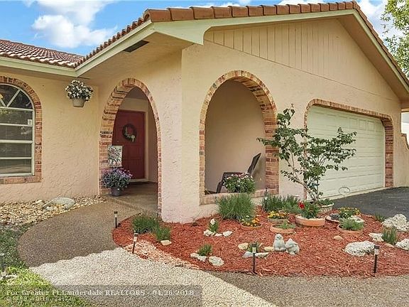 This is a SAFE Home with an Alarm System, Hurricane safe 2 Car Garage door.  It even has a brand new Electrical Panel... all that goes to lower your homeower's insurance premiums.
