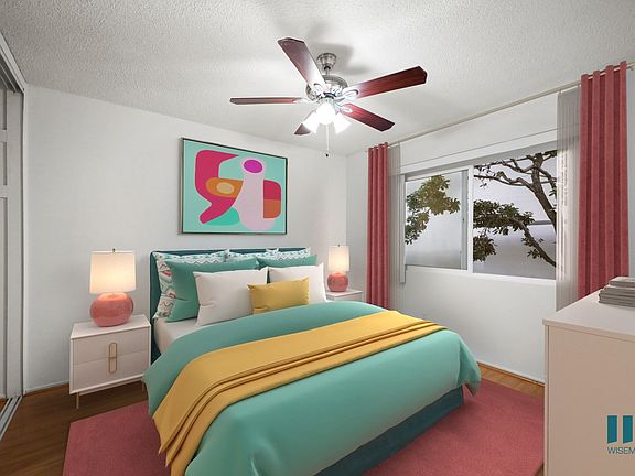 Bedroom with Mirrored Closet, Vinyl Flooring, Ceiling Fan, and Windows