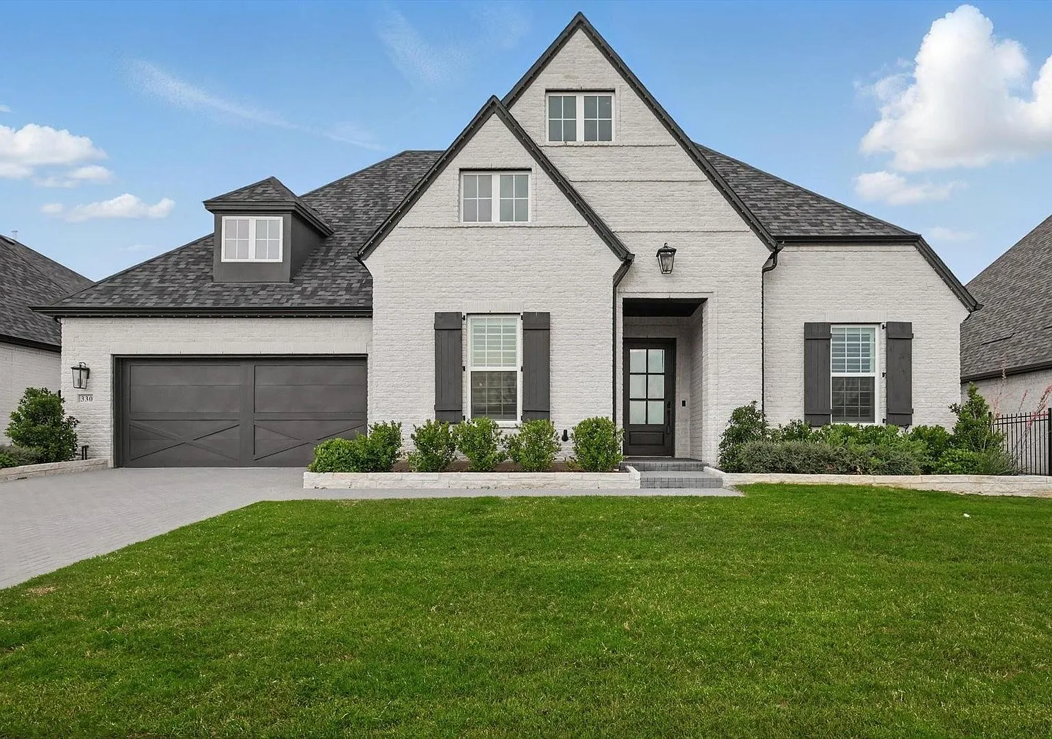 Beautifully maintained home in the highly sought-after Windsong Ranch community — Photo 1