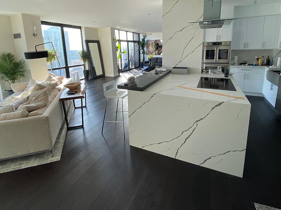 Full city views from each of the eight 9' floor to ceiling windows. Remote control shades for each.