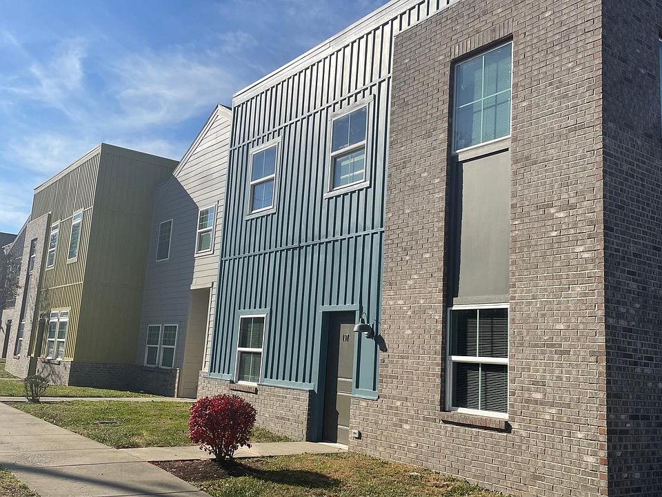 Stillwell AVE view of property, The complex is "L shaped" and one side goes down Stillwell AVE, one side down Burley AVE