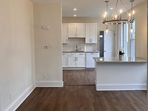 Bright, open floor plan Living room into dining room