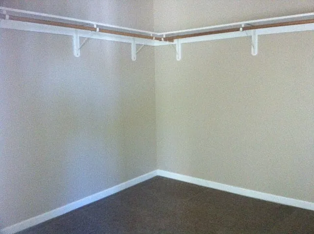 walk in closet attached to bedroom