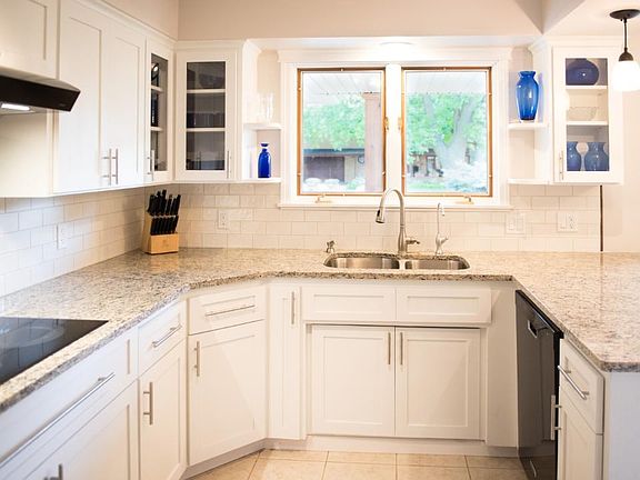 Updated kitchen with granite countertops.
