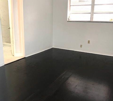 Large master bedroom hardwood floors