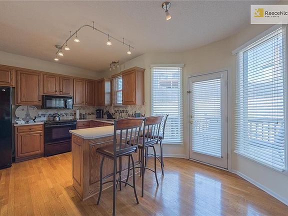 Kitchen and door leading to deck in the backyard