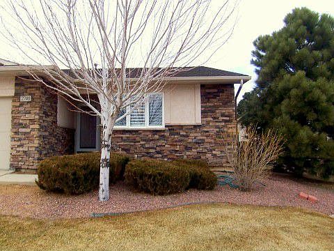 Nicely Landscaped with Mature Trees & Shrubs