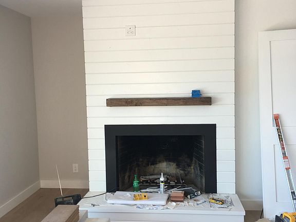 shiplap custom designed fireplace. 