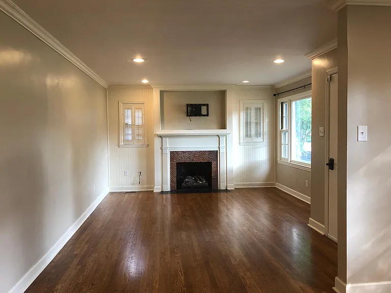Open main living space with hardwood floors throughout