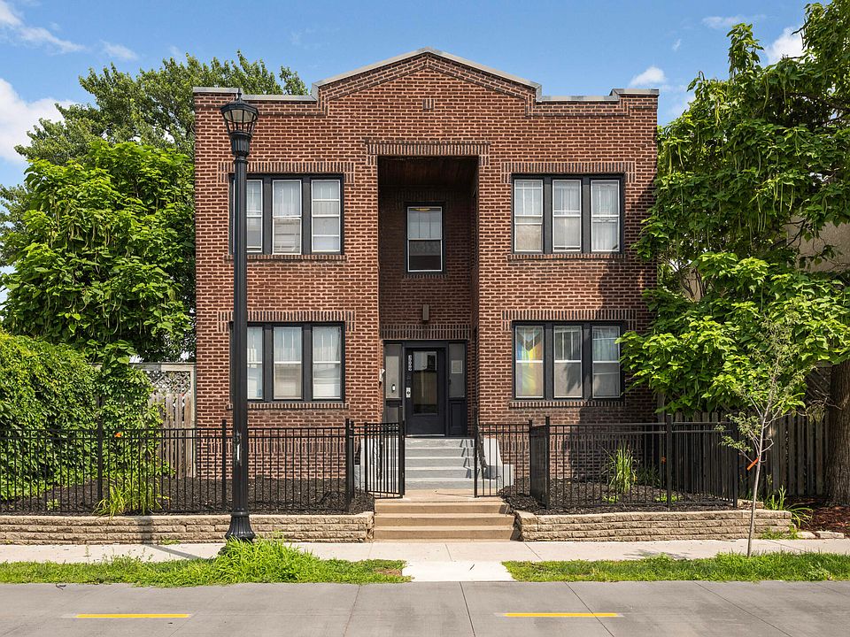 Front with fenced in front yard