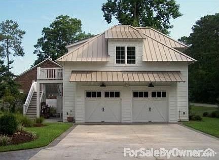 Two Car Garage W/ Guest Suite Above
						:
						Security System for House and Garage, Prog. Irrigation and Landscaping Lighting