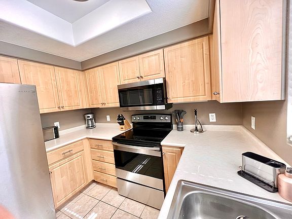 Fully stocked kitchen with brand new appliances.