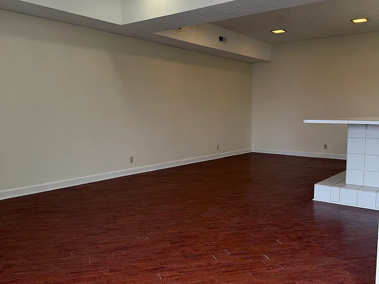 Main room with Kitchen in background. 3rd half-bath on the left (out of the pic)