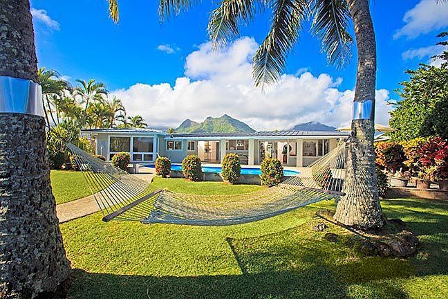 Gorgeous lakefront home with mountain views, as well.