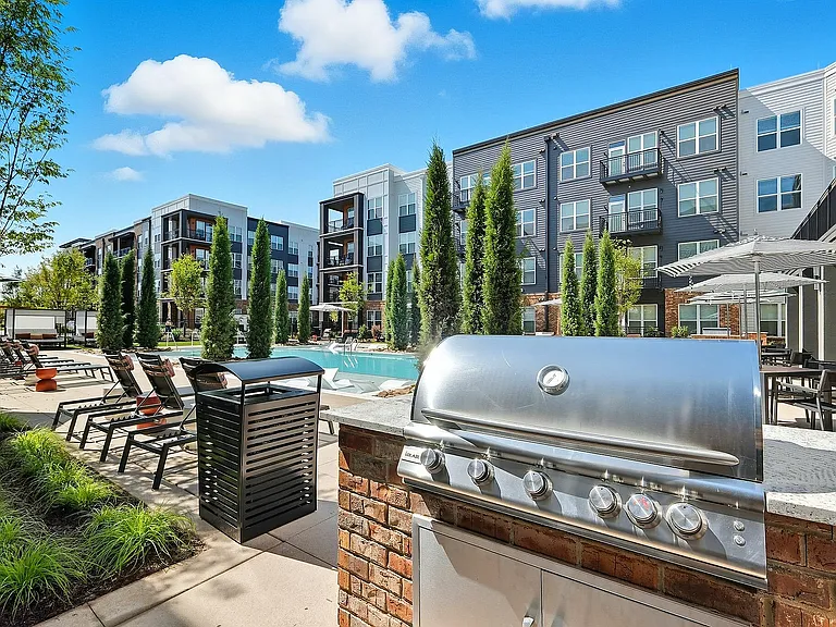 Fire up the grill and enjoy outdoor dining steps from your front door