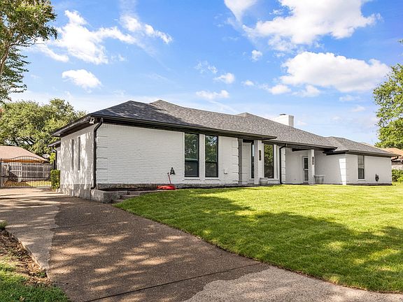 2 Car garage. Long driveway for parking.