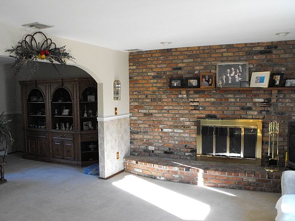 view from Kitchen. Hardwood floors under carpeting