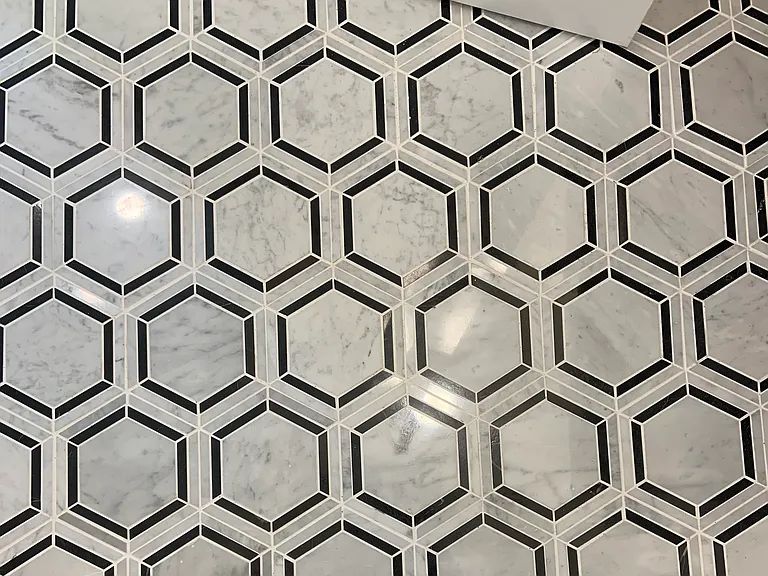 Marble hexagon flooring in primary bath